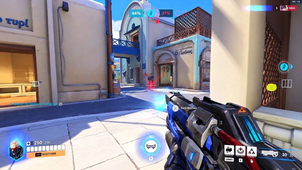 Soldier: 76 on Ilios with a circular hitbox highlight on a distant enemy.
